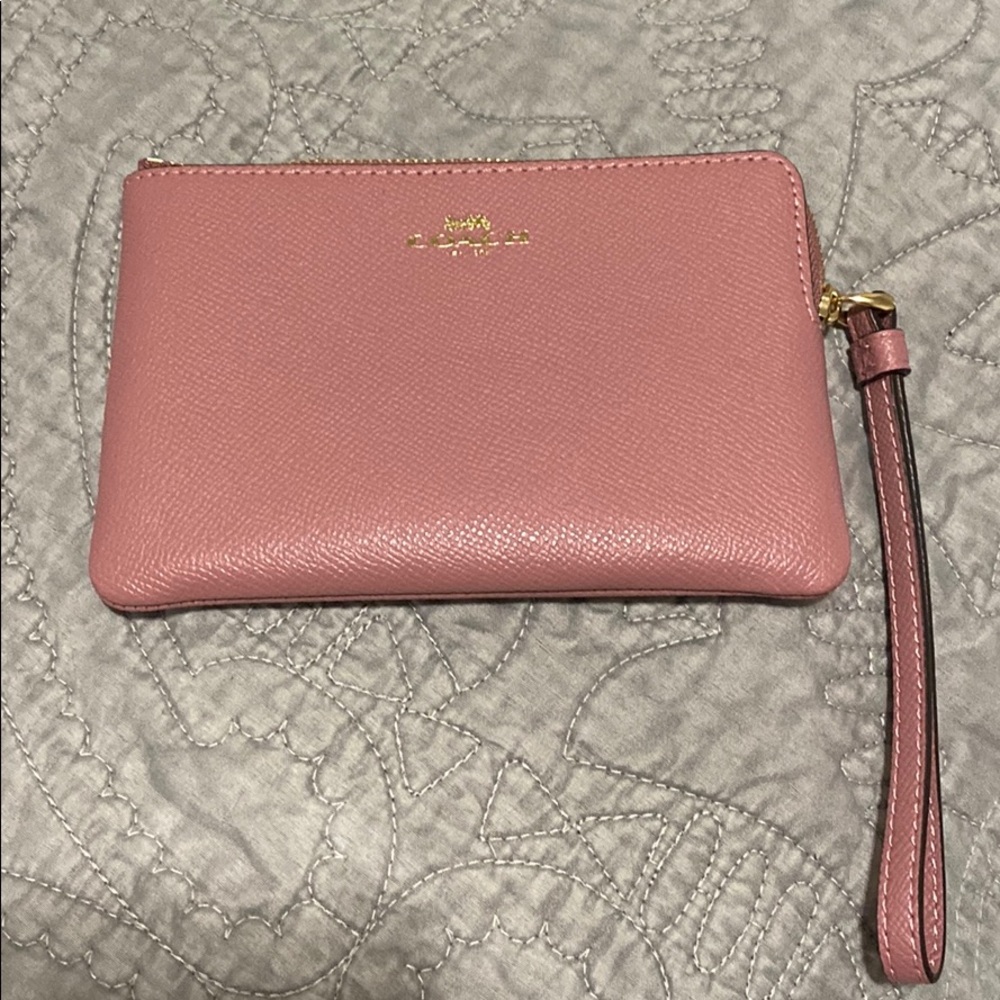 Coach light pink wristlet
